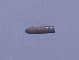 120mm shell on the ground.