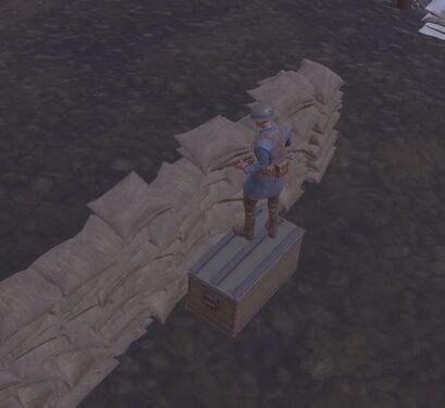 A soldier can see and shoot over a Sandbag Wall if standing on a Storage Box.