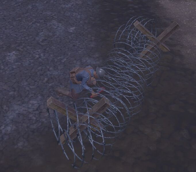 File:Wrenching Barbed Wire.jpg