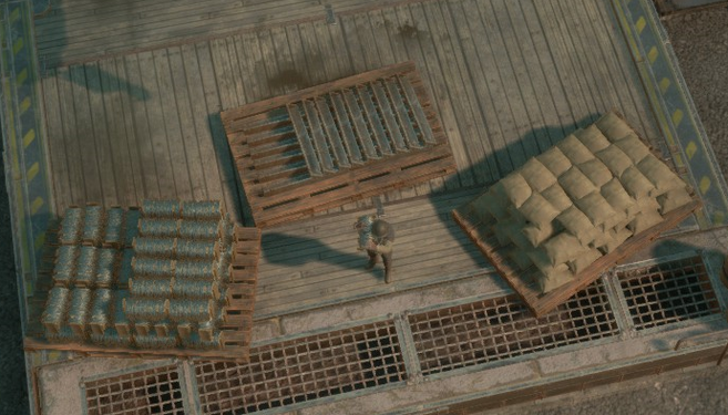 Three Material Pallets loaded with Barbed Wire, Metal Beams, and Sandbags